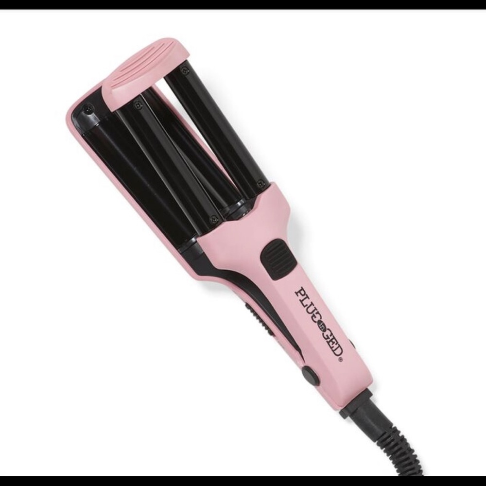 Travel sized waver/curling iron. Brand new condition. Used one time.
